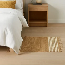 Jutowy dywanik 60x90 cm z frędzlami beżowy białe pasy